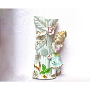 vintage porcelain flower vase, 5 ¼ inches by 2 ¾ inches.